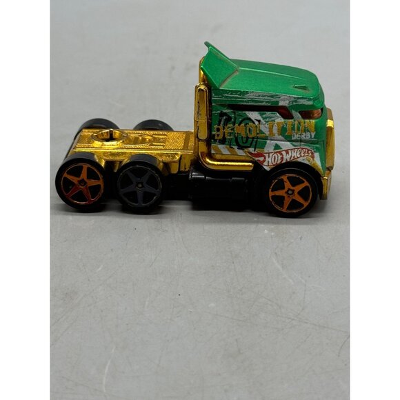 Hot Wheels Green & Gold Die-Cast Demolition Derby Truck With Black & Orange Whee - Picture 4 of 7